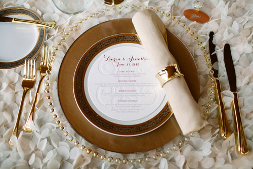 Sophisticated gold, tan and brown place setting with circular menu - Photo by Dan Stewart Photography